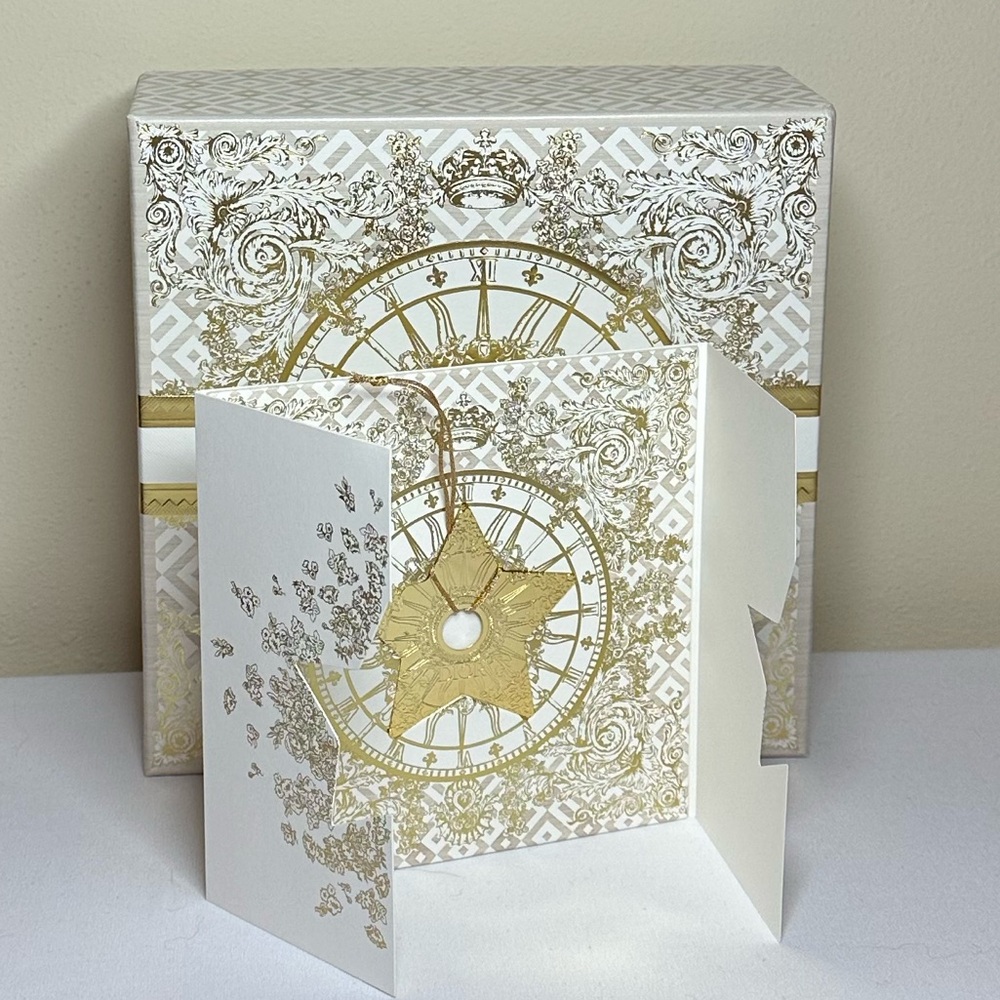 Dior Holiday Star with Elegant Gold and White Decorative Box